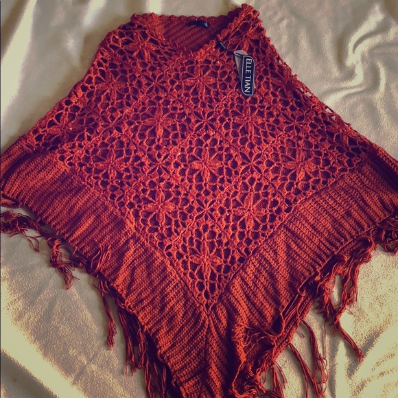 Never worn tag attached cute light weight poncho. - Picture 1 of 1